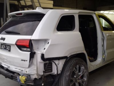 Refit time after spraypainting Jeep Cherokee