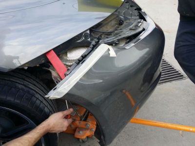 Removal front bumper bar.